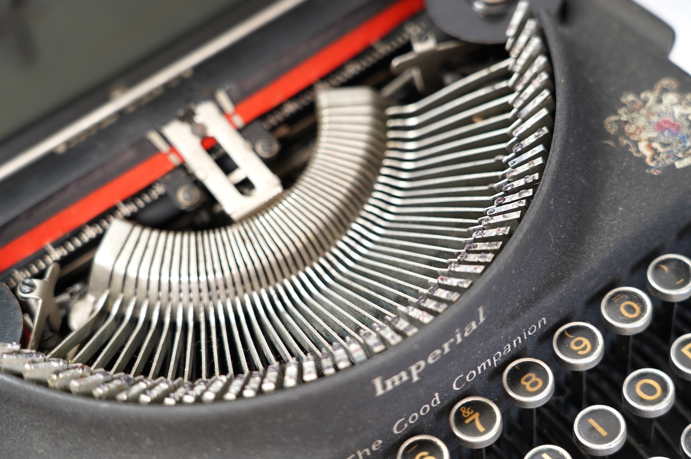 An Imperial portable typewriter, The Good Companion. Condition - poor to fair, some wear, minor damage and losses and surface rust to metal parts on the case